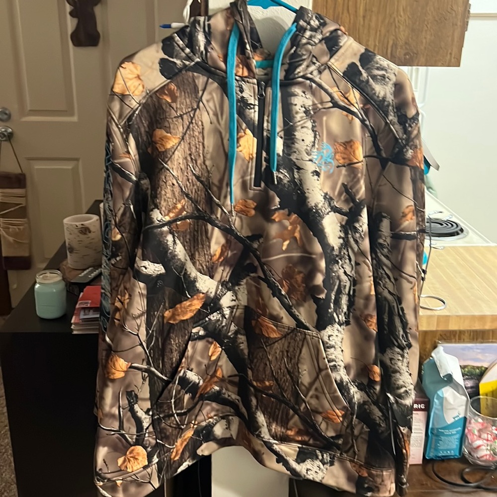 Legendary Whitetails Camo w/turquoise lettering. Size XL